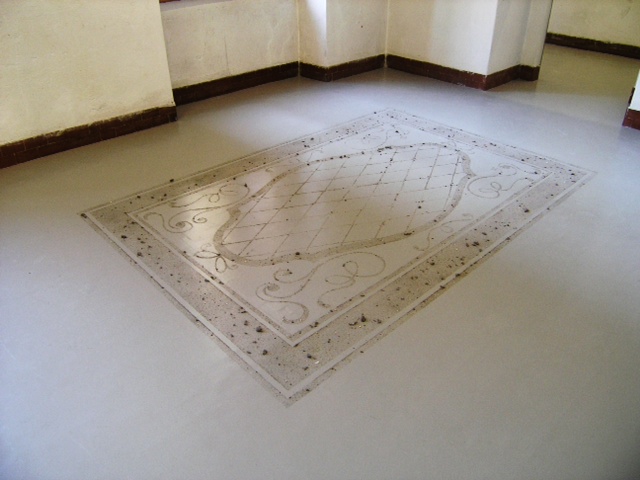 Igor Eskinja's installation: Dust, Ashes, and Dirt in Contemporary Art and Design at the Museum of Arts and Design in New York consists in a floor carpet 
